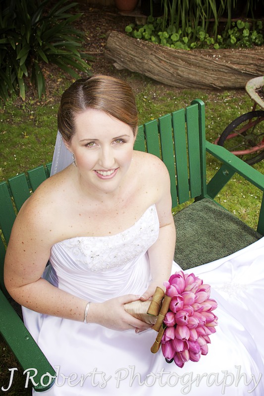 Bride smiling up at camera - wedding photography sydney